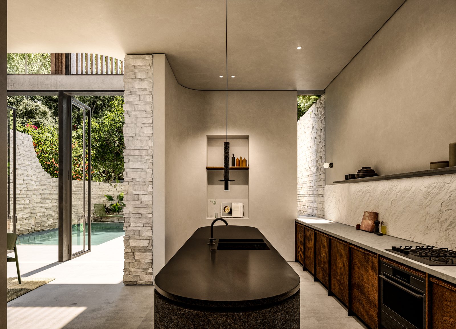 Kin Villas kitchen with stone island and pool view